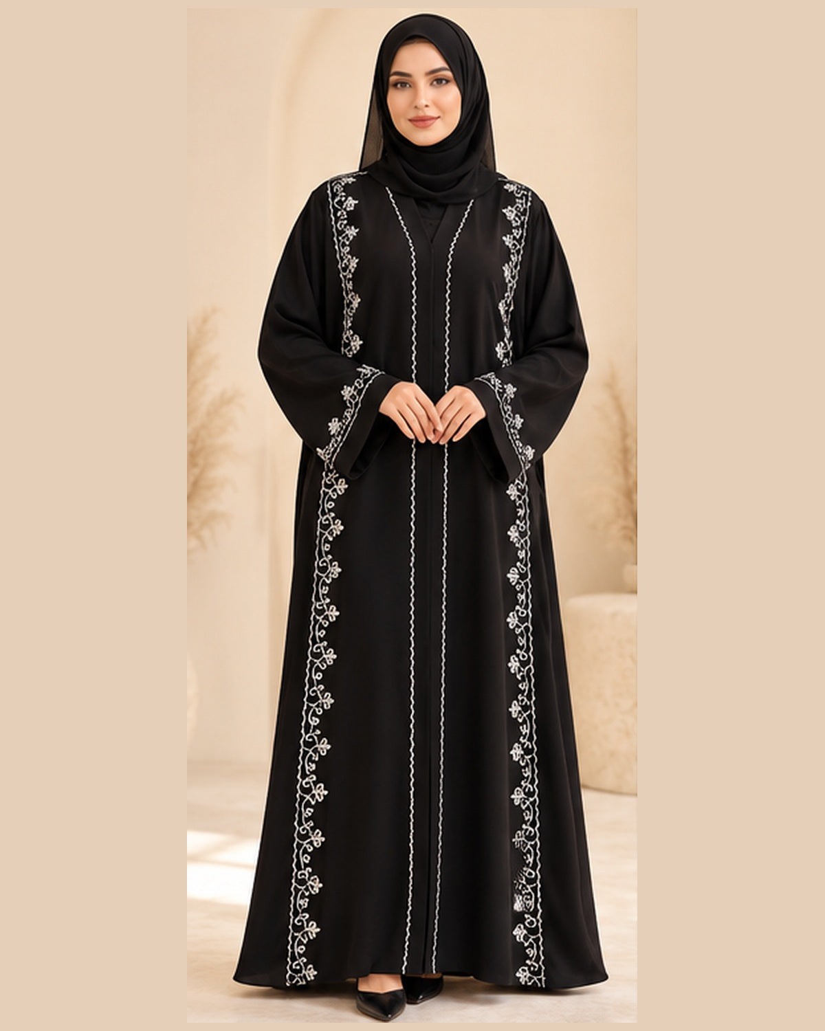 Black abaya front view with white vine trim