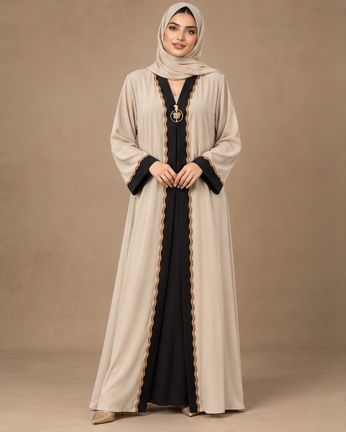 Ivory abaya with black center panel and gold trim front view