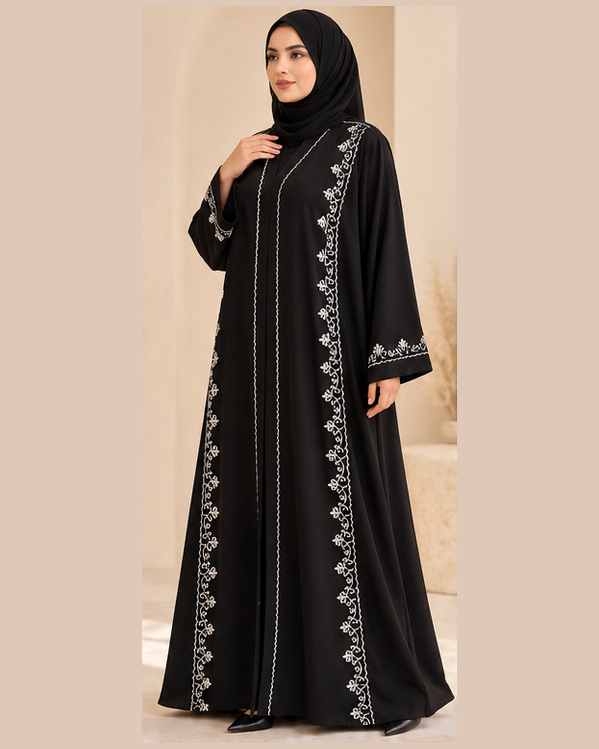 Black abaya three-quarter view with white vine trim