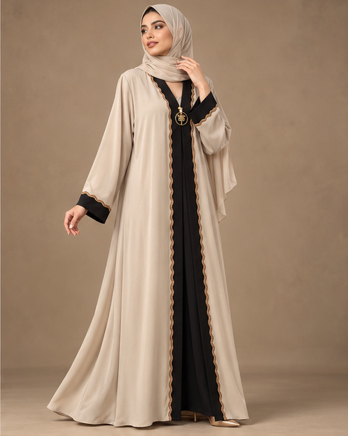 Ivory abaya with black center panel and gold trim three-quarter view