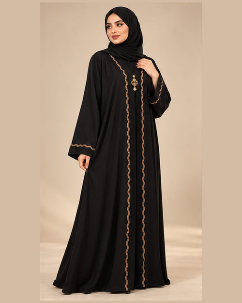 Black abaya with bronze wavy trim three-quarter view