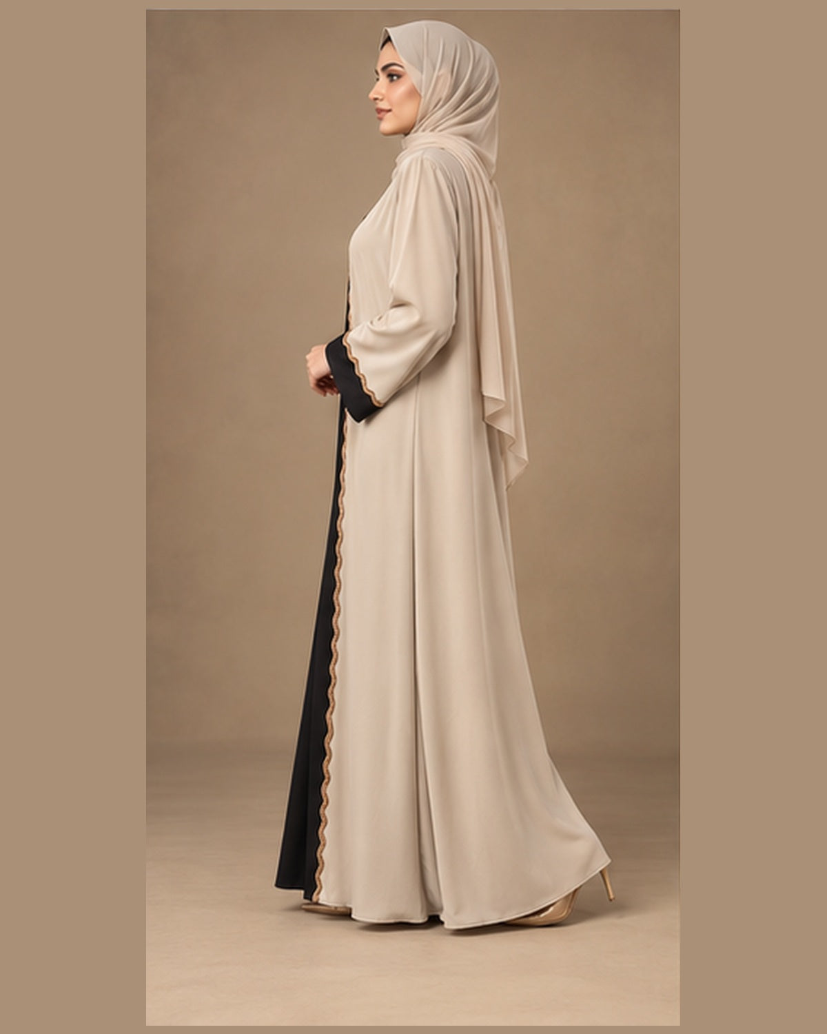 Ivory abaya with black center panel and gold trim side view