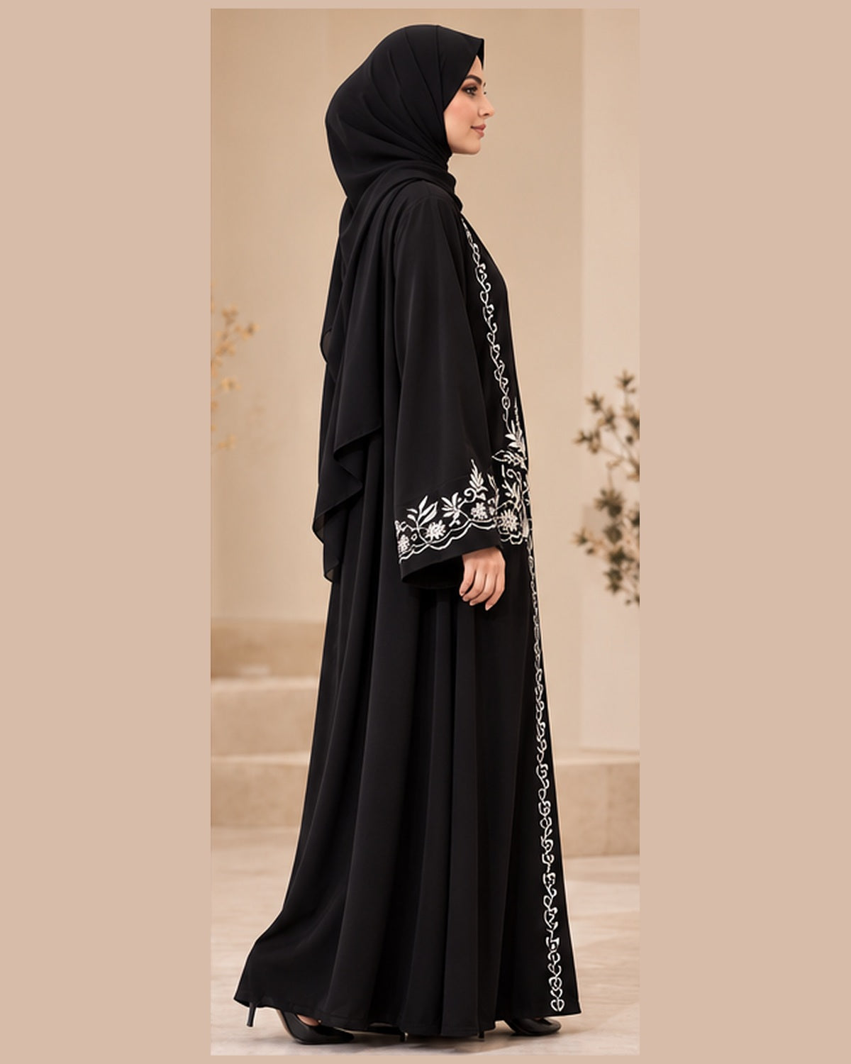 Black abaya side view with ivory floral embroidery