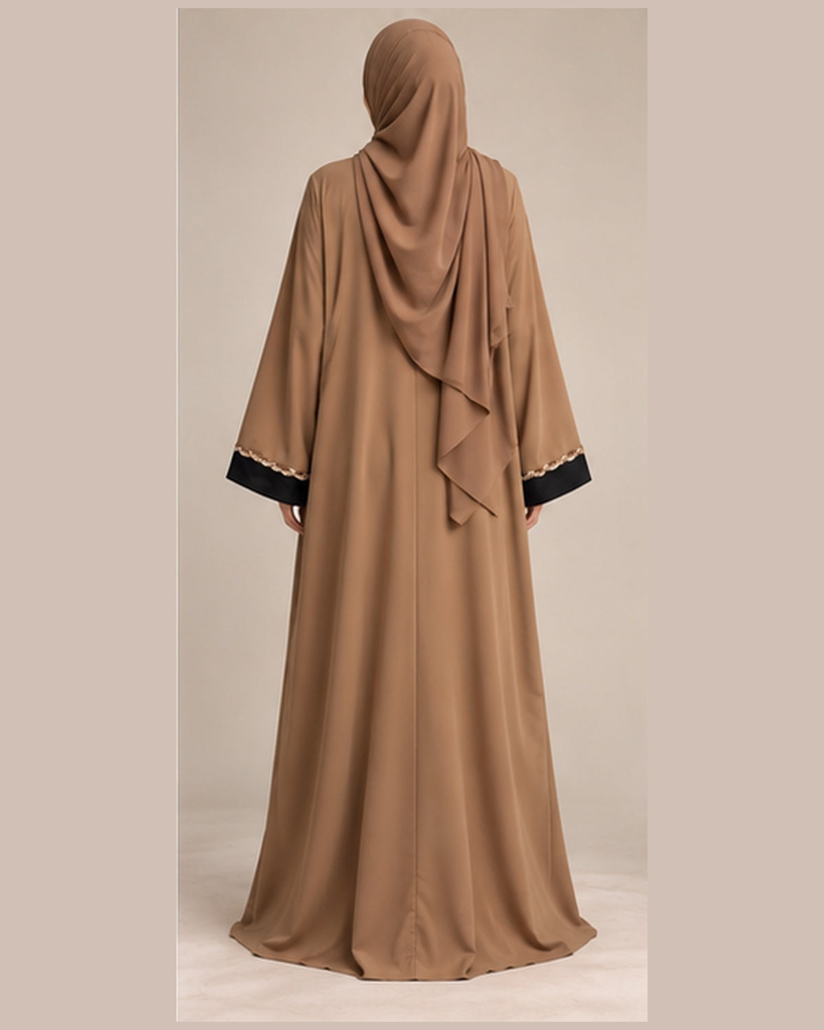 Camel abaya with black center panel and gold trim back view