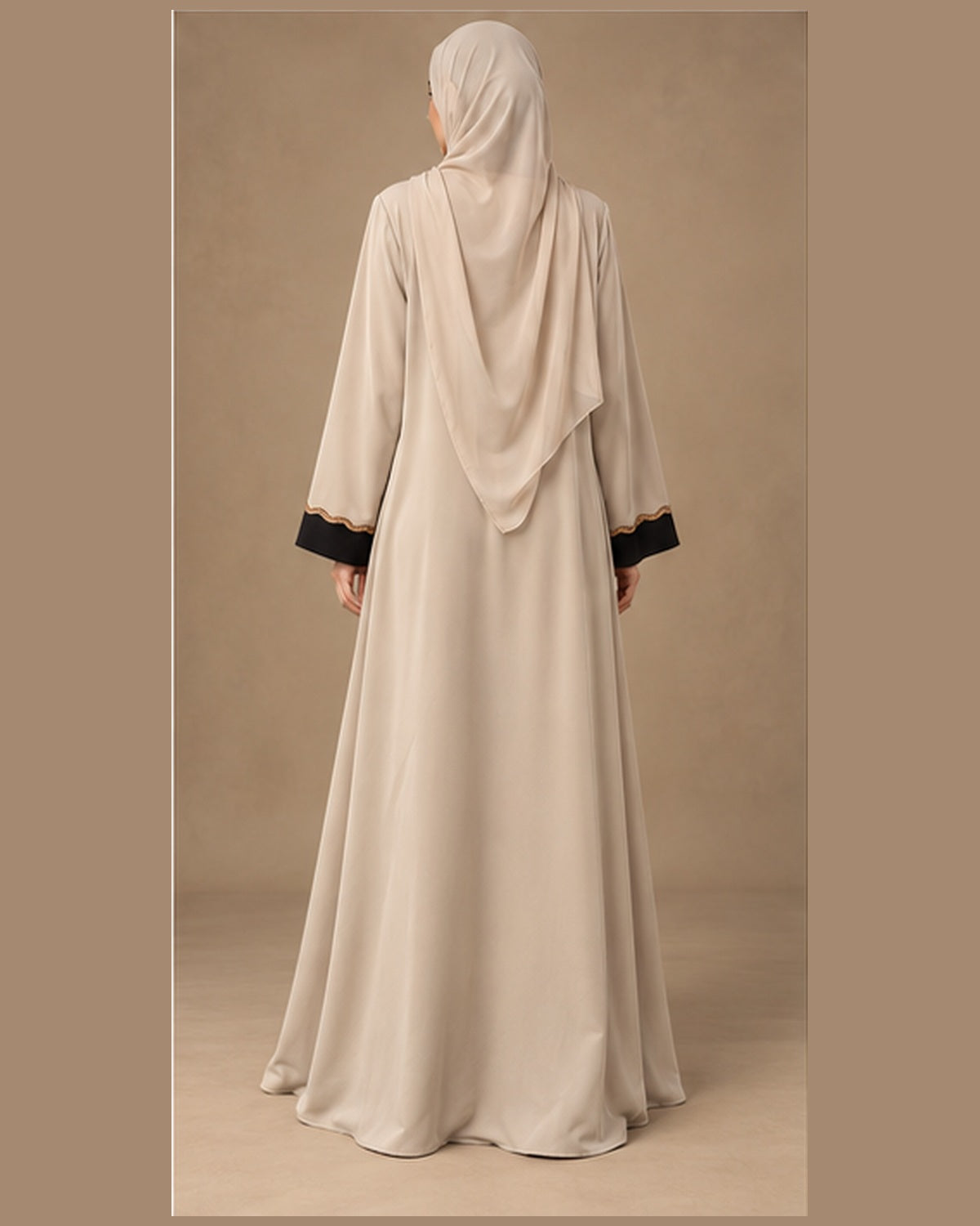 Ivory abaya with black center panel and gold trim back view