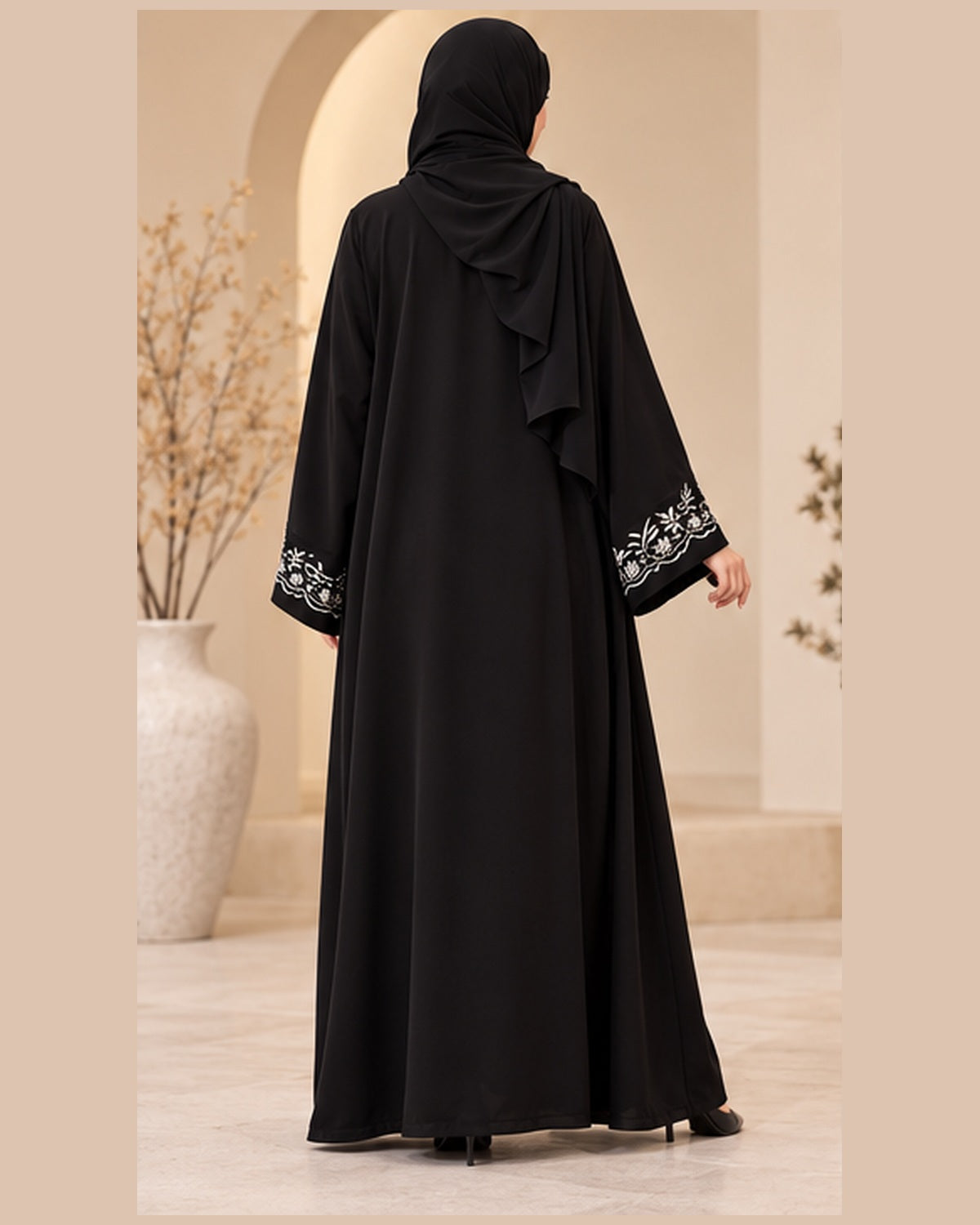Black abaya back view with ivory floral embroidery